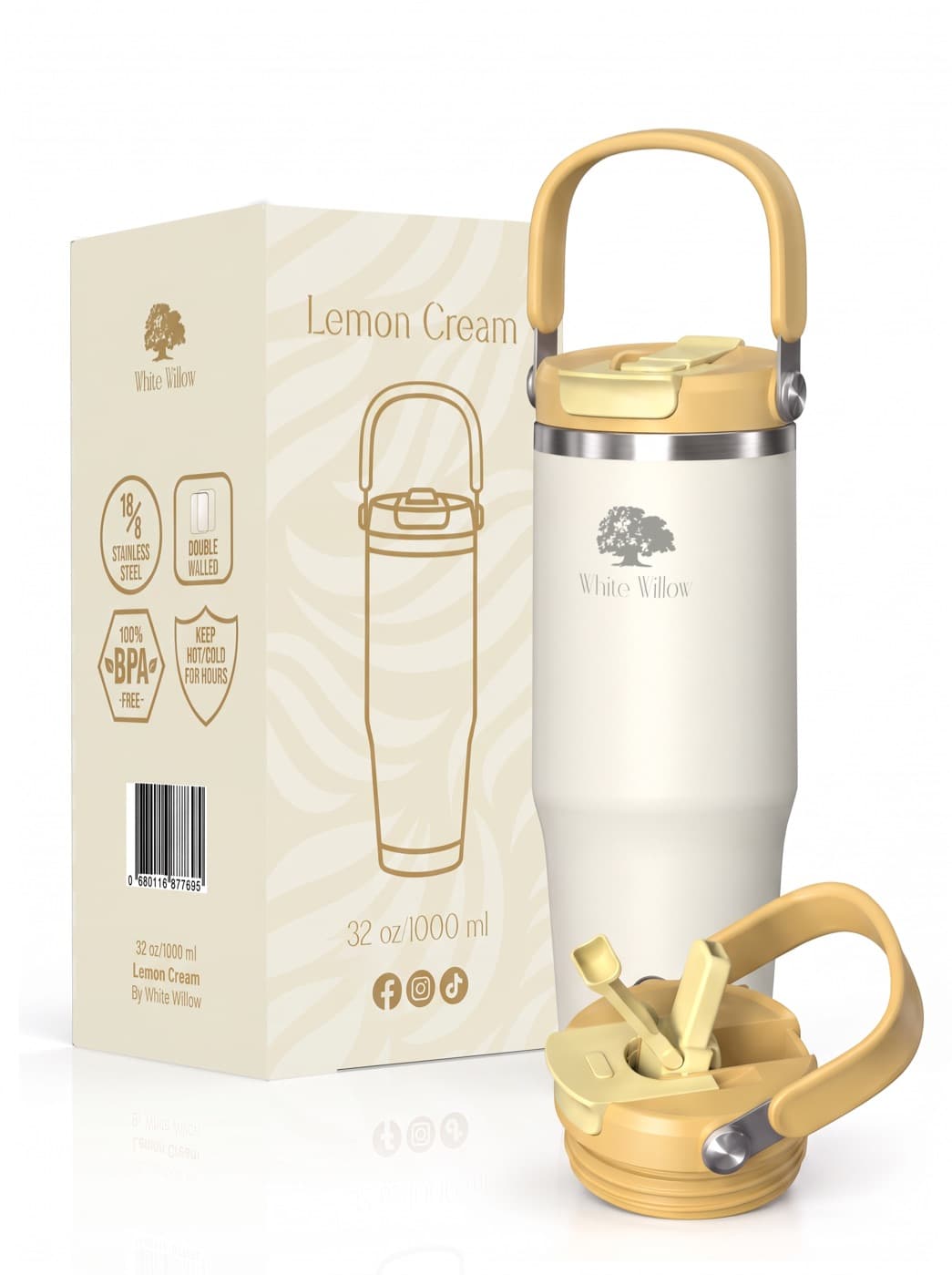 Lemon Cream bottle in warm ivory with a gold carry handle and lid, shown with its box and a second lid.